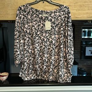Wonderly black top with pale pink floral design NWT